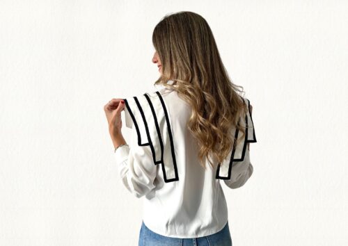 Camisa blanca ribete negro